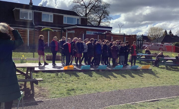 Image of KS2 shone in the sun during their outdoor music concert!